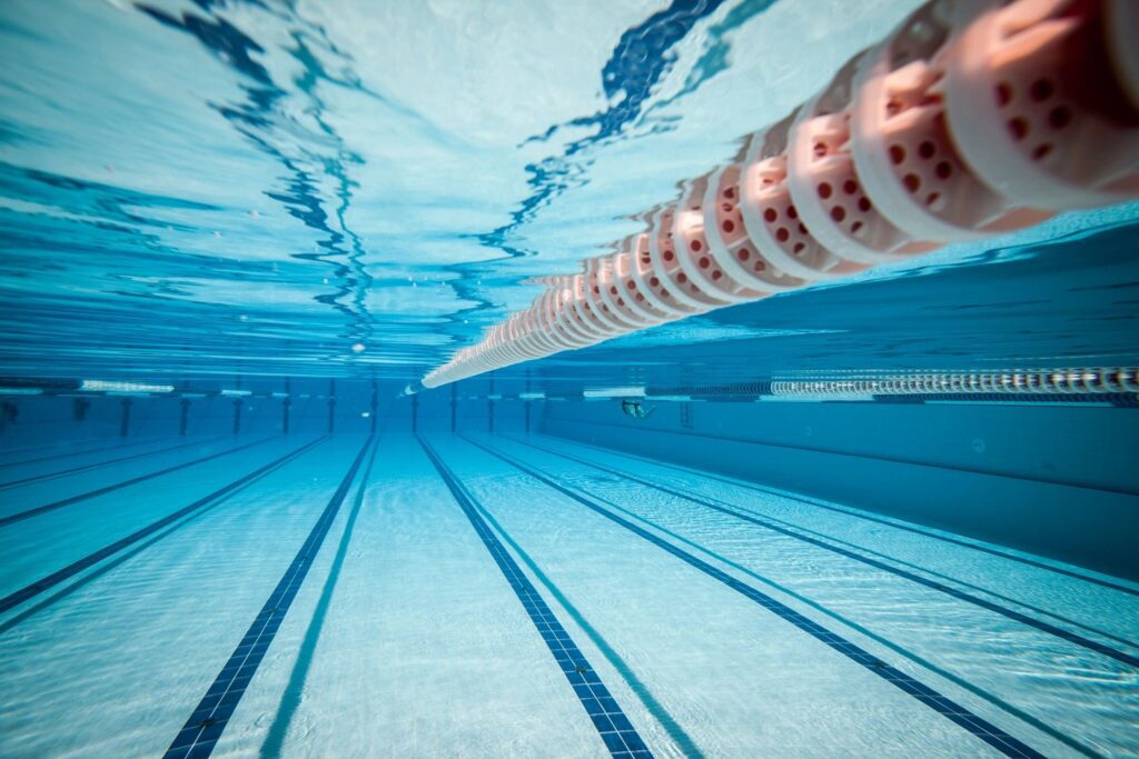 Underwater view of an empty swimming pool.